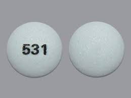 Tramadol 100 mg UK tablet shown in clear close-up view displaying the tablet shape and surface details.