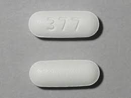 Tramadol 50 mg UK tablet shown in close-up view displaying its shape, colour, and surface markings.